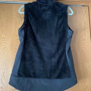 northface small ladies black vest.  brand new but no tags never worn.smoke free